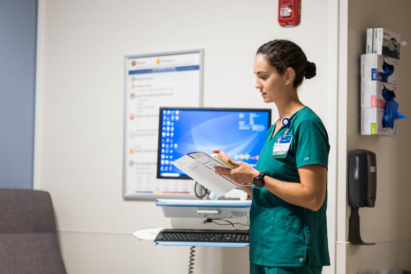 A Virginia Tech MSND student enters into a hospital room to speak with a patient
